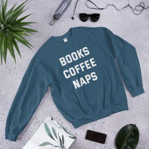 a sweatshirt that says "books coffee naps"