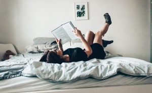an introvert reading at home