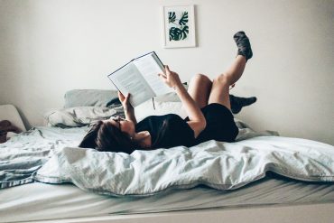an introvert reading at home
