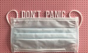 A face mask with the words "Don't Panic" for each introverted Myers-Briggs personality type