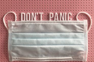 A face mask with the words "Don't Panic" for each introverted Myers-Briggs personality type