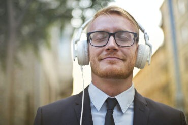 An introvert man with headphone