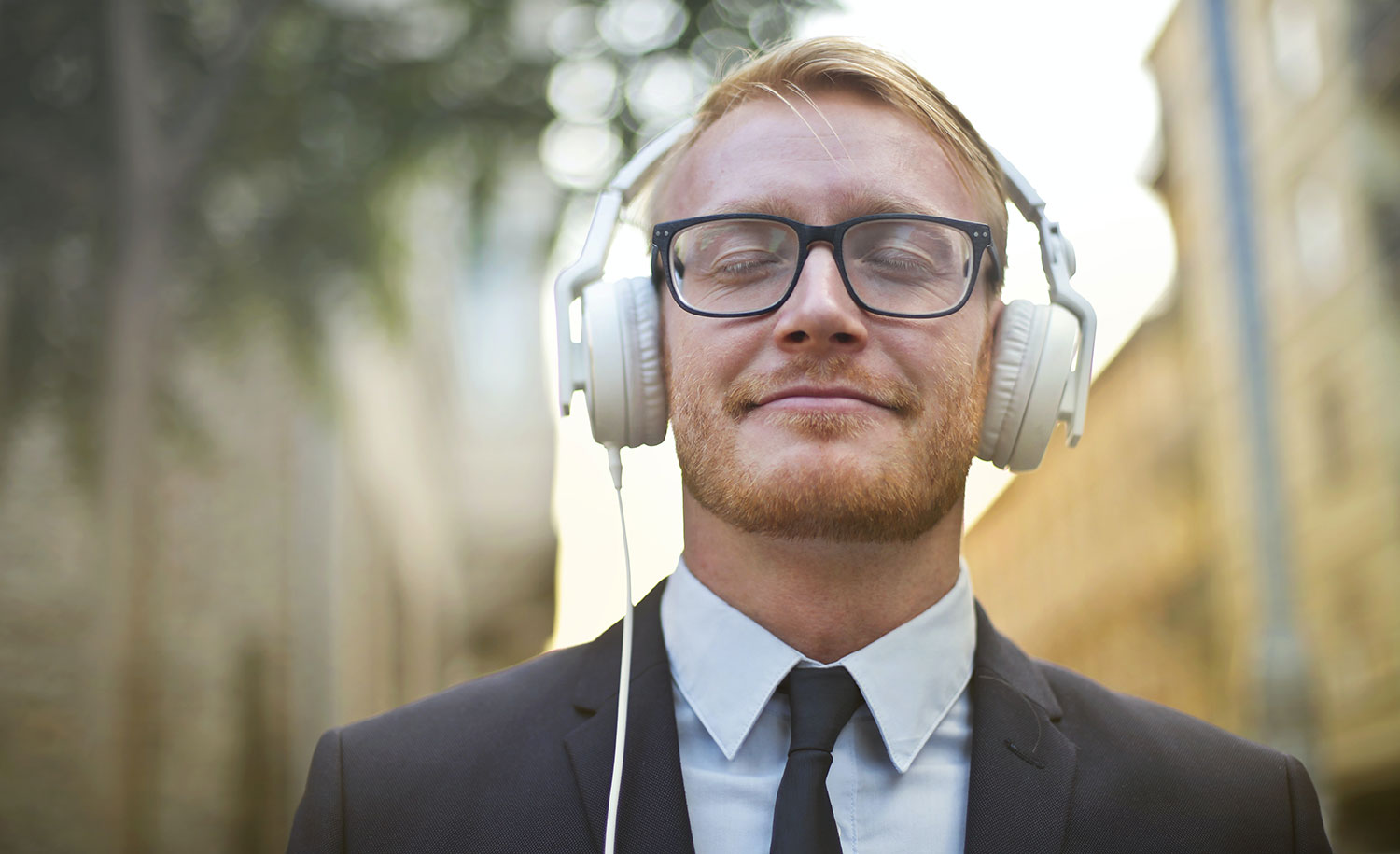 An introvert man with headphone
