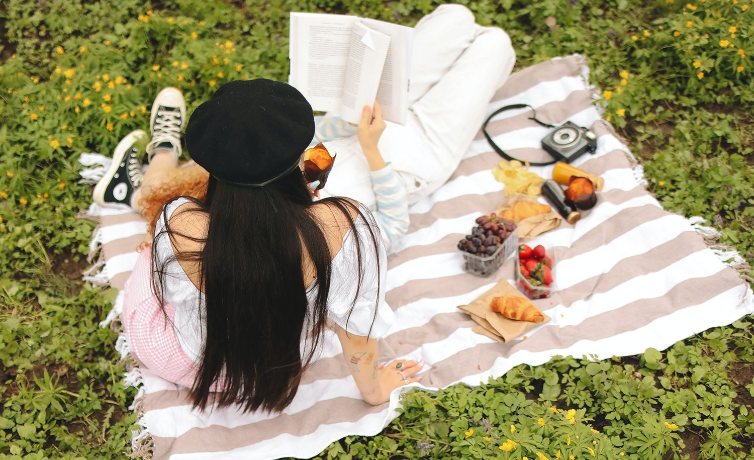 An introvert has a picnic out in nature