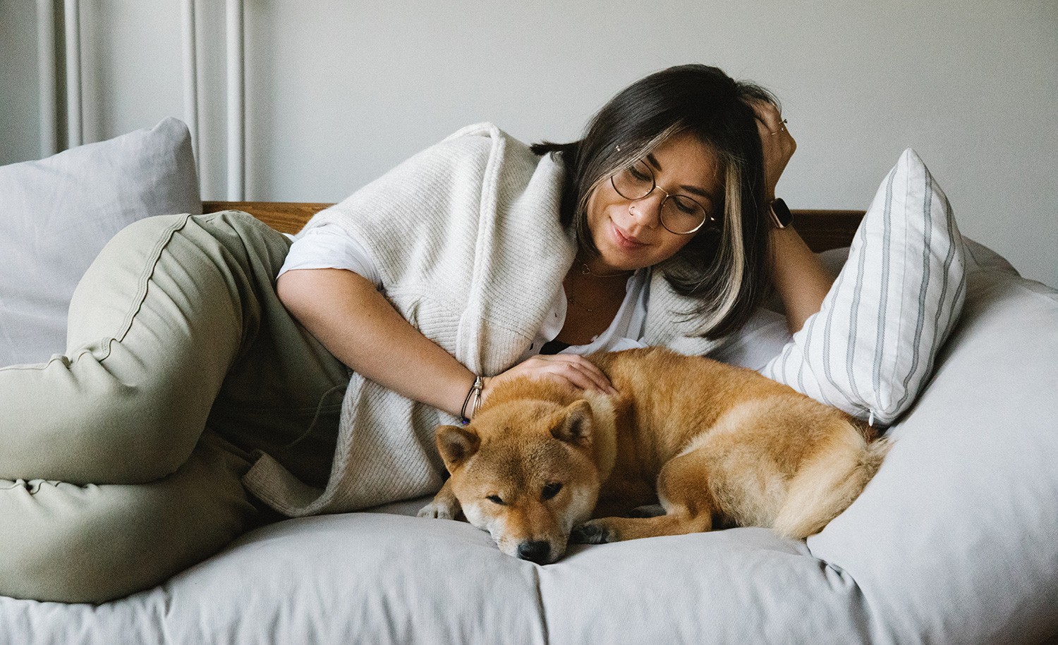 An introvert maximizes her energy by relaxing with her dog