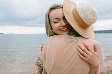 An introvert hugs her friend