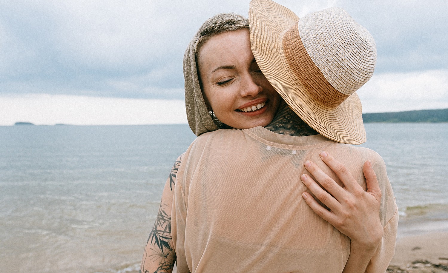 An introvert hugs her friend