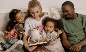 An introverted parent reads to her children