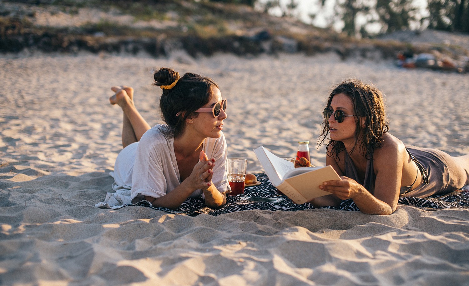 Two introverts talk on the beach